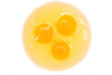 Fresh raw eggs on white background. High protein ingredient of food.