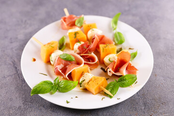 melon,  mozzarella and prosciutto ham