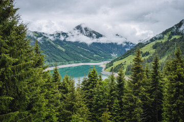 Fototapeta premium Schlegeis Stausee lake view from mountain hiking path trail. Zillertal, Austria, Europe