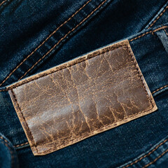 Label or leather label on jeans with space to copy. Blank for applying information. Casual...
