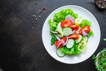 salad vegetable tomato, cucumber, pepper, onion, lettuce meal snack copy space food background rustic. top view