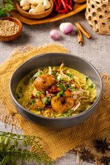 Mie Soto Ayam or Soto Medan with prawn is Traditional chicken soup with Noodle from North Sumatra. 

Soto is a traditional Indonesian soup mainly composed of broth, meat, fried patties and vegetables