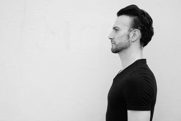 Black and white portrait of handsome Italian man profile view