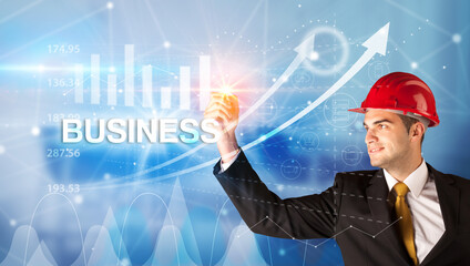 Young Businessman with helmet concept