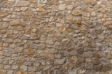 Architecture textures, detailed and rustic of paired masonry granite, traditional spanish granite wall