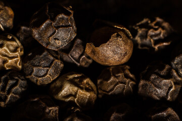 closeup of black and red peppercorns. macro photography. Spices for cooking food.