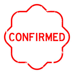 Grunge red confirmed word rubber seal stamp on white background