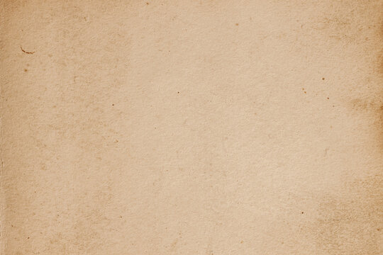 Texture of old moldy paper with dirt stains, spots, inclusions cellulose, brown cardboard, vintage background