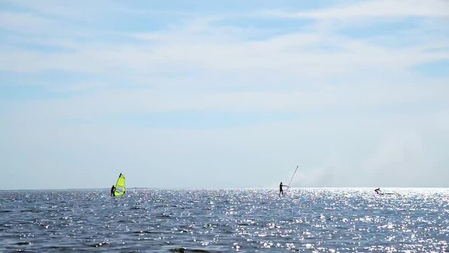 Summer seascape with windsurfers on the Gulf of Finland