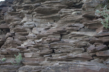 Stone mountain made of brown natural slate