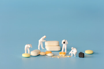 Miniature people : People exploring medicine.