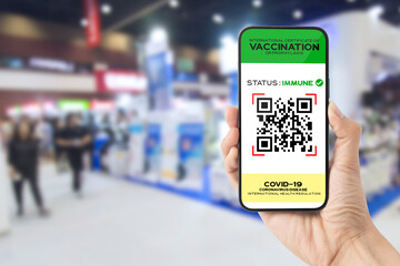 Vaccine digital passport on smartphone screen as proof that the holder has been vaccinated against...