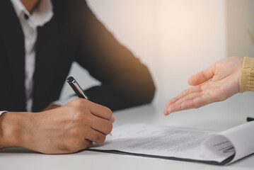 client signing in contract document agreement after closing business deal
