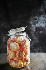 Garlic Pickled in Vinegar Soy Sauce in Glass Bottles