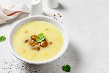 Cream of mushroom soup in a bowl. Space for text.