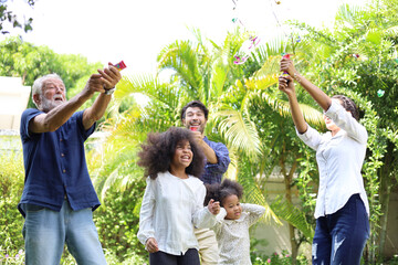 Fototapeta premium Family leisure, holidays, fun and happy time concept in garden park at home.