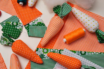 Fabric carrot from multicolor fabric. Craft for children. Easter decoration, gift.