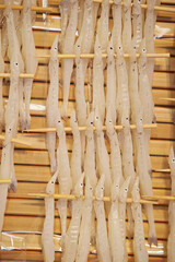 small dried fish on skewers