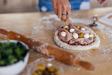 Making of delicious pizza.