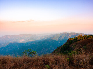 beautiful nature of hills and mountains complex with morning mist atmosphere at Tak, Thailand.