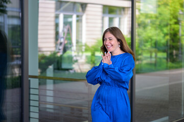 Delighted enthusiastic woman walking happy