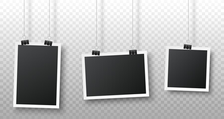 Realistic blank photo frame hanging on a clip isolated on transparent background. Vertical, horizontal, square photo frames. Black empty vintage photo frames set. Vector illustration