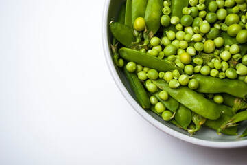 young green peas close green vegetables food and drink objects