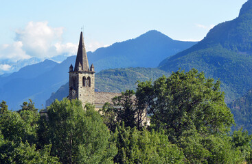 Fototapeta na wymiar Saint Vincent, Aosta Valley, Italy - The small and antique Romanesque-style church in the village of Moron