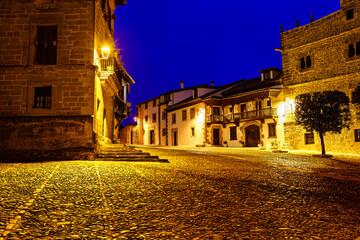 Fototapeta na wymiar Old town street with cobblestone ground at dusk. Santillana del Mar, Santander.