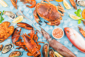 Seafood dinner, seafood dinner with fresh lobster, crab, mussel and oyster as background