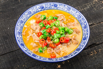A delicious Chinese Cantonese dish with beef in golden soup