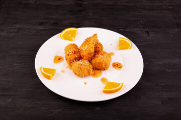 fried chicken in orange sauce
