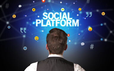 Rear view of a businessman, social media concept