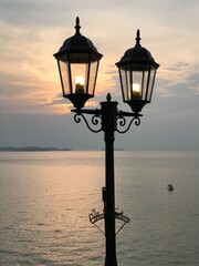 Obraz premium lamp at sunset