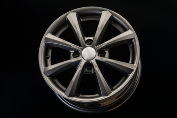 the new alloy wheel is gray on a black background. auto parts and tuning