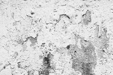 Texture of a concrete wall with cracks and scratches which can be used as a background