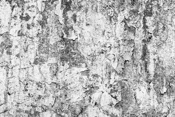 Texture of a concrete wall with cracks and scratches which can be used as a background