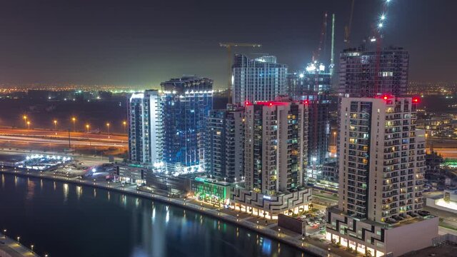 Towers at the Business Bay aerial all night timelapse in Dubai, United Arab Emirates