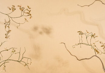 Autumn concept with dried tree branches, leaves and shadows. Minimalism, copy space.