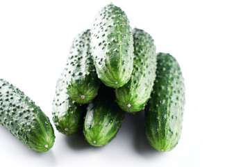 Set of fresh whole cucumbers on white background, food pattern. Garden cucumber wallpaper backdrop design