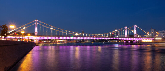 Evening view of the Crimean bridge from the embankment of Moscow