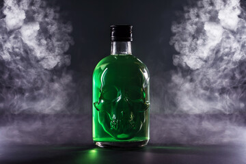 bottle in the shape of a human skull with a green drink on a background of smoke