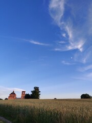 summer rural landscape with an old church