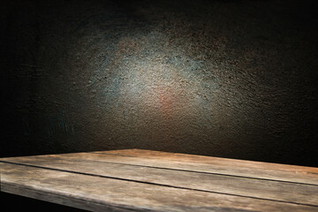 dark wall with focal light with empty wooden table for your product montage