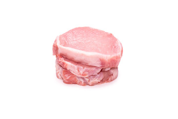 Raw pork pieces isolated on a white background.