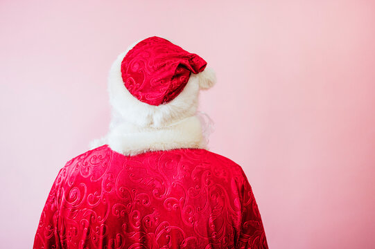 Man Dressed As Santa Claus Turned Around Showing His Back