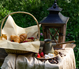 morning breakfast.Croissant,strawberries,and coffee.