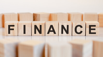 finance word made with building blocks, concept