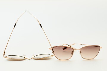 Conceptual elegant Sunglasses isolated on white background. Sun glasses summer accessories as...
