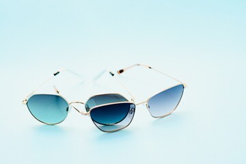Conceptual elegant Sunglasses isolated on white background. Sun glasses summer accessories as...